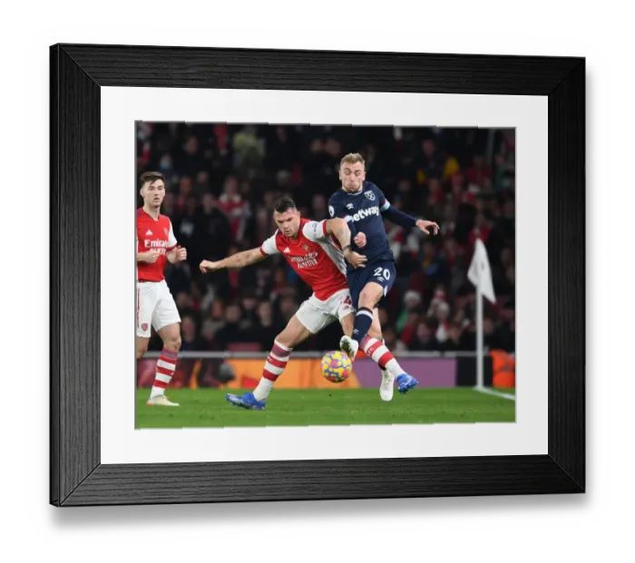 Framed Print : Xhaka vs. Bowen: A Premier League Showdown - Arsenal vs. West Ham Framed Print : Xhaka vs. Bowen: A Premier League Showdown - Arsenal vs. West Ham