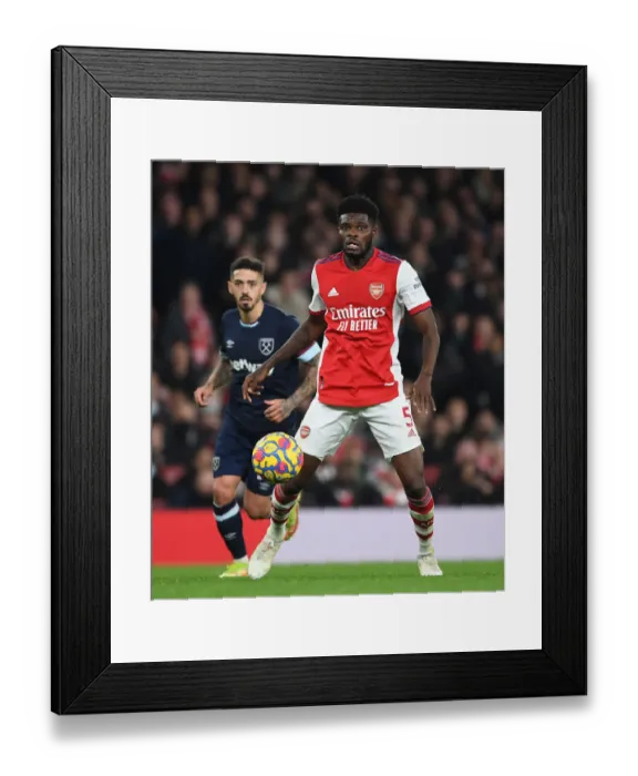 Framed Print : Thomas Partey in Action: Arsenal vs. West Ham United, Premier League 2021-22 Framed Print : Thomas Partey in Action: Arsenal vs. West Ham United, Premier League 2021-22
