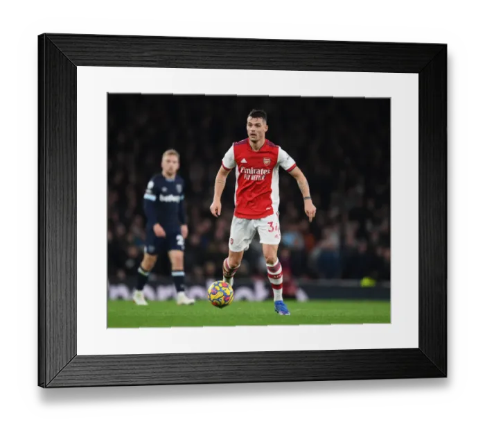 Framed Print : Granit Xhaka: Arsenal's Midfield Maestro in Action Against West Ham United, Premier League 2021-22 Framed Print : Granit Xhaka: Arsenal's Midfield Maestro in Action Against West Ham United, Premier League 2021-22