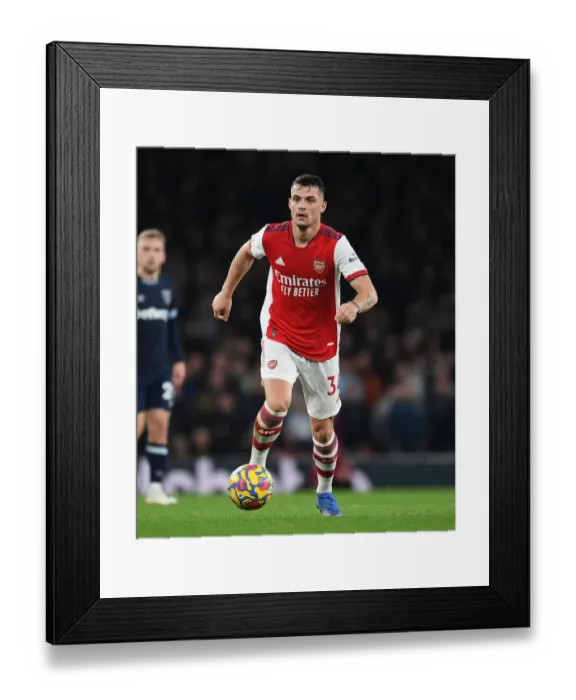 Framed Print : Arsenal's Granit Xhaka in Action Against West Ham United - Premier League 2021-22