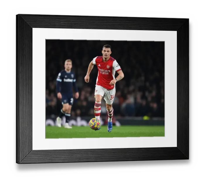 Framed Print : Granit Xhaka in Action: Arsenal vs West Ham United, Premier League 2021-22 Framed Print : Granit Xhaka in Action: Arsenal vs West Ham United, Premier League 2021-22
