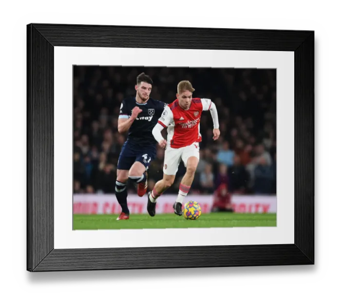 Framed Print : Emile Smith Rowe's Slick Moves: Outsmarting Declan Rice in Arsenal's Premier League Victory