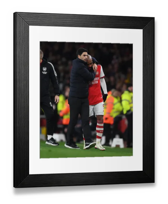 Framed Print : Mikel Arteta Comforts Substituted Alexis Lacazette: An Emotional Moment at Arsenal vs West Ham United