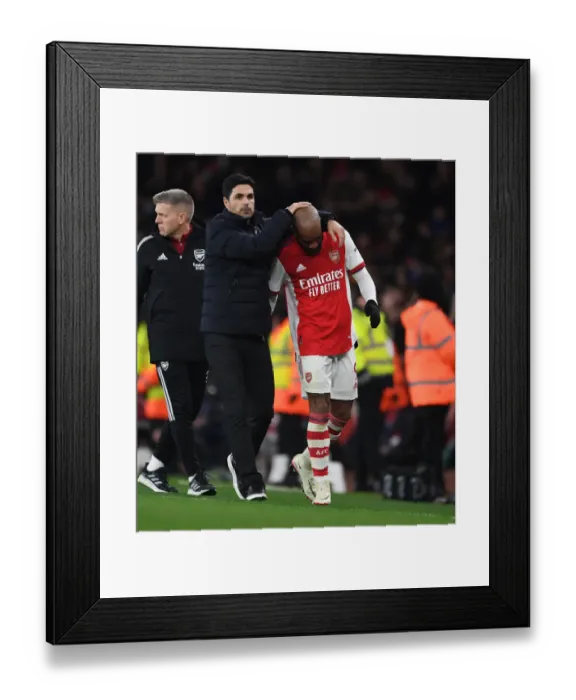 Framed Print : Arsenal Manager Mikel Arteta Embraces Alex Lacazette in Emotional Moment during Arsenal vs West Ham United (2021-22)