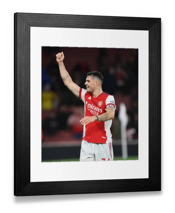 Framed Print : Arsenal's Granit Xhaka Shows Appreciation to Fans in Emotional Post-Match Moment (Arsenal vs West Ham United, 2021-22)