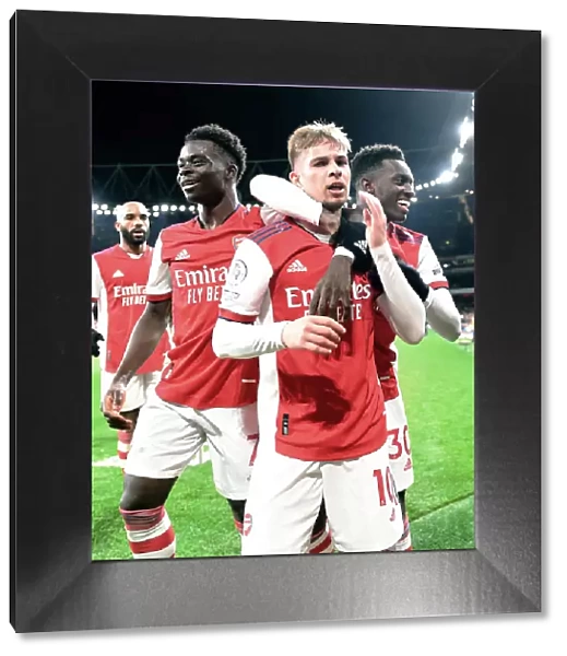 Arsenal Celebrate: Smith Rowe, Saka, and Nketiah Score Against West Ham in Premier League