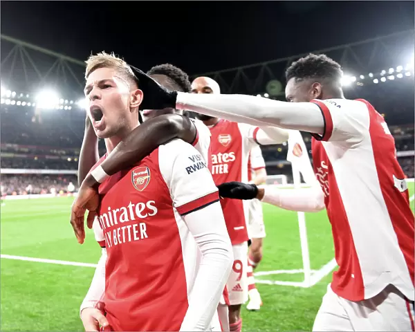 Arsenal's Smith Rowe and Nketiah Celebrate Goals Against West Ham in Premier League Clash