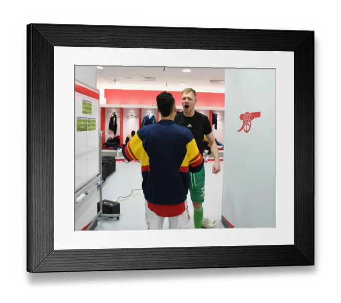 Framed Print : Martinelli and Ramsdale: Arsenal's Unyielding Duo Celebrate Hard-Fought Victory over West Ham United