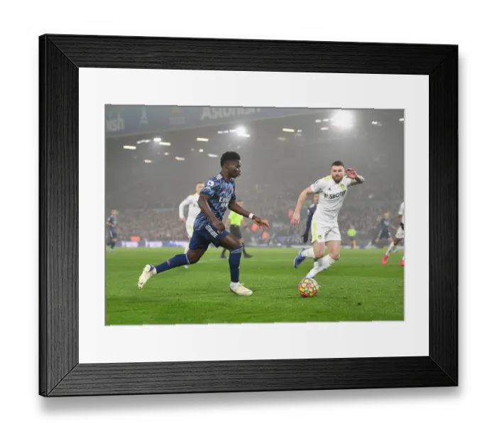 Framed Print : Premier League Showdown: Arsenal vs Leeds United at Elland Road (December 2021)