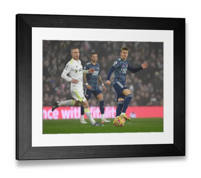 Framed Print : Martin Odegaard Clashes with Adam Forshaw: Leeds United vs. Arsenal, Premier League 2021-22 Framed Print : Martin Odegaard Clashes with Adam Forshaw: Leeds United vs. Arsenal, Premier League 2021-22