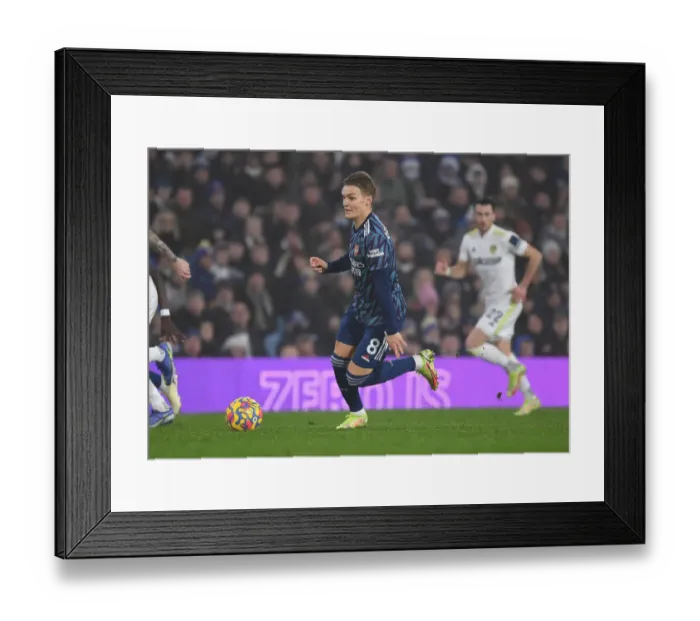Framed Print : Martin Odegaard Shines in Arsenal's Premier League Battle at Leeds United (2021-22) Framed Print : Martin Odegaard Shines in Arsenal's Premier League Battle at Leeds United (2021-22)
