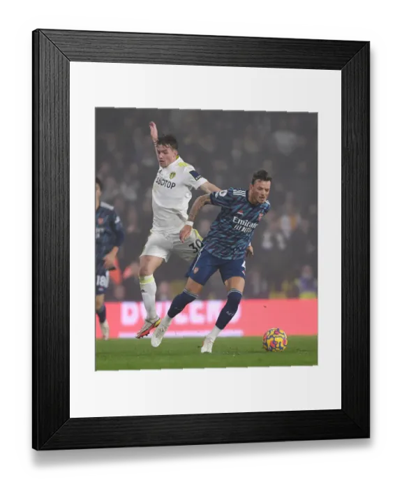 Framed Print : Clash at Elland Road: Leeds United vs. Arsenal, Premier League Showdown - White vs. Gelhardt