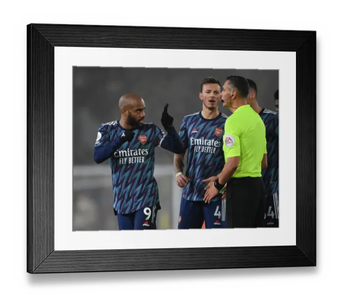 Framed Print : Arsenal's Alex Lacazette Controversially Argues with Referee During Leeds United Clash