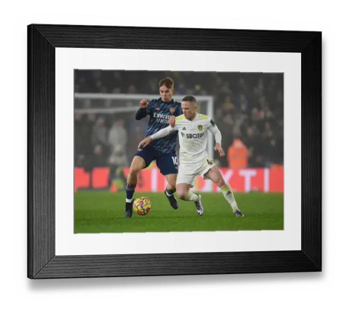 Framed Print : Smith Rowe vs. Forshaw: A Premier League Battle at Elland Road