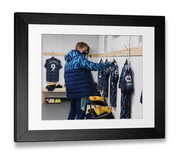 Framed Print : Martin Odegaard: Pre-Match Focus in Arsenal Changing Room Ahead of Leeds United Clash (Premier League 2021-22)