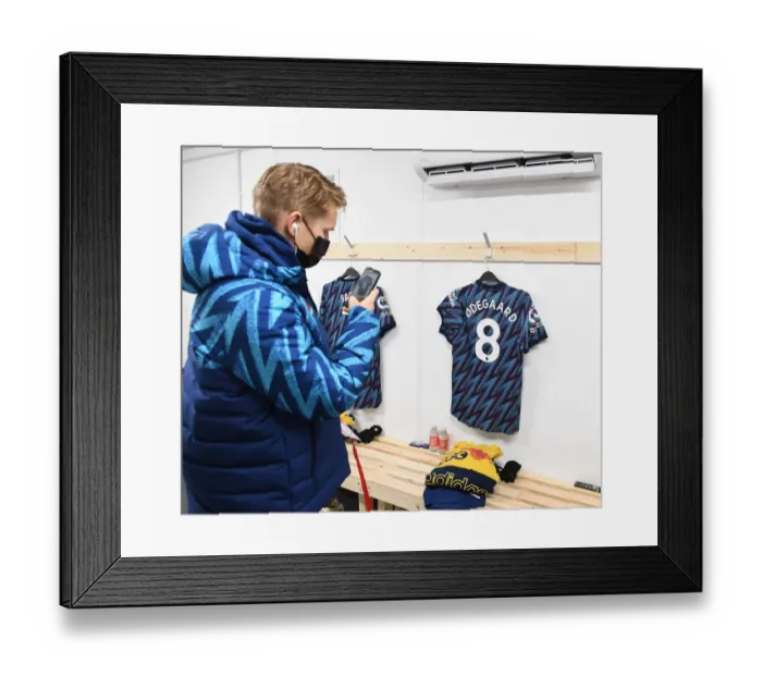 Framed Print : Martin Odegaard's Focus: Arsenal's Changing Room Moment before Leeds United Clash (Premier League 2021-22) Framed Print : Martin Odegaard's Focus: Arsenal's Changing Room Moment before Leeds United Clash (Premier League 2021-22)