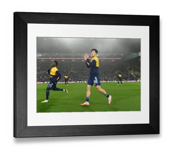 Framed Print : Arsenal's Tomiyasu Applauding Fans: Leeds United vs Arsenal, Premier League 2021-22 Framed Print : Arsenal's Tomiyasu Applauding Fans: Leeds United vs Arsenal, Premier League 2021-22