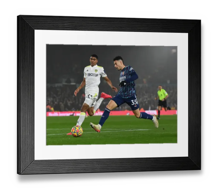 Framed Print : Martinelli vs Drameh: Battle at Elland Road - Leeds United vs Arsenal, Premier League 2021-22 Framed Print : Martinelli vs Drameh: Battle at Elland Road - Leeds United vs Arsenal, Premier League 2021-22