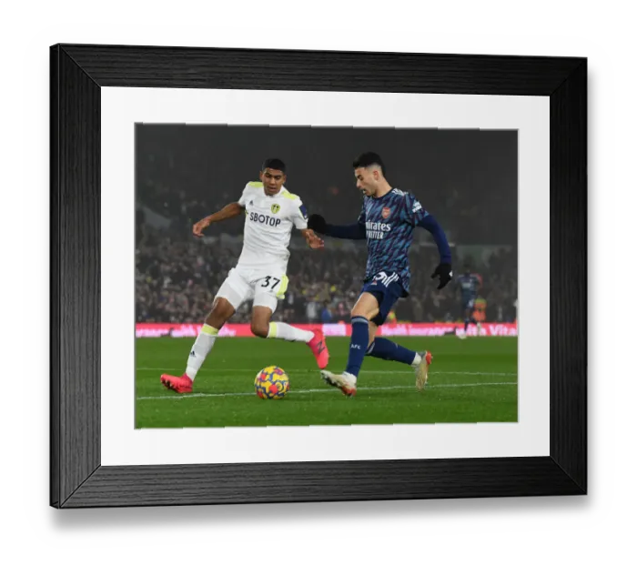 Framed Print : Gabriel Martinelli vs. Cody Drameh: Battle at Elland Road - Leeds United vs. Arsenal, Premier League 2021-22 Framed Print : Gabriel Martinelli vs. Cody Drameh: Battle at Elland Road - Leeds United vs. Arsenal, Premier League 2021-22