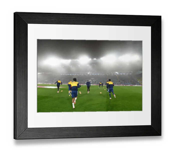 Framed Print : Arsenal Players Gear Up for Leeds United Clash in Premier League: Warm-Up Session Framed Print : Arsenal Players Gear Up for Leeds United Clash in Premier League: Warm-Up Session