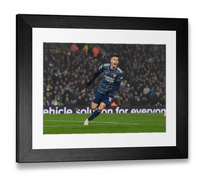 Framed Print : Martinelli Scores First: Arsenal Triumphs Over Leeds United in Premier League Clash