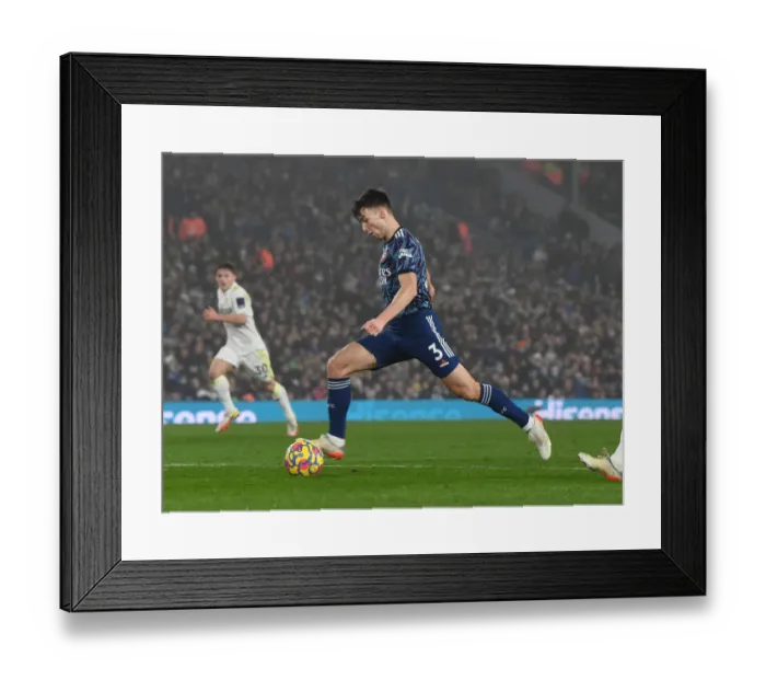 Framed Print : Arsenal's Kieran Tierney in Action: Premier League Showdown against Leeds United (2021-22) Framed Print : Arsenal's Kieran Tierney in Action: Premier League Showdown against Leeds United (2021-22)