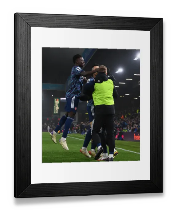 Framed Print : Martinelli, Saka, and Smith Rowe: Celebrating Arsenal's Win Against Leeds United (December 2021)
