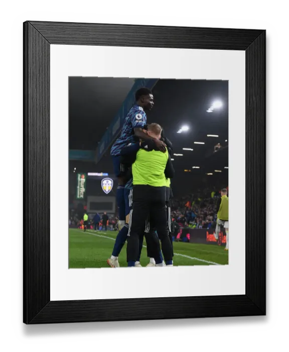 Framed Print : Martinelli's Brace: Arsenal's Victory Over Leeds United in the Premier League