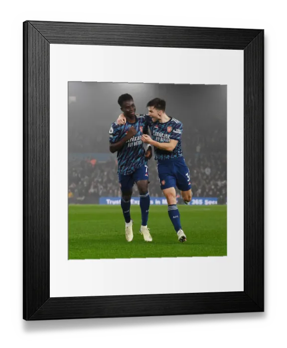 Framed Print : Saka and Tierney Celebrate Arsenal's 3rd Goal vs Leeds United (Premier League 2021-22) Framed Print : Saka and Tierney Celebrate Arsenal's 3rd Goal vs Leeds United (Premier League 2021-22)