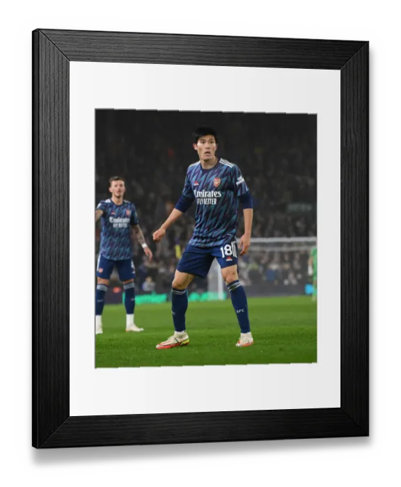 Framed Print : Arsenal's Tomiyasu in Action against Leeds United - Premier League 2021-22 Framed Print : Arsenal's Tomiyasu in Action against Leeds United - Premier League 2021-22