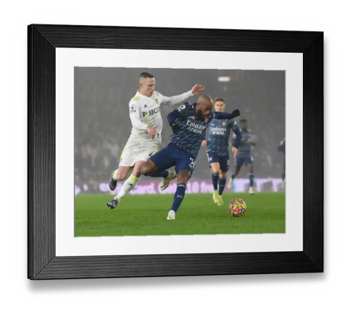 Framed Print : Leeds United vs. Arsenal: Lacazette Clashes with Forshaw in Premier League Showdown