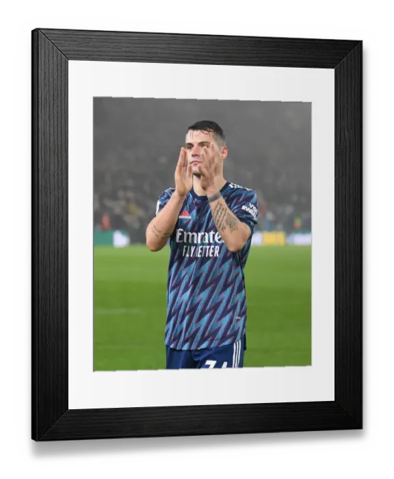 Framed Print : Granit Xhaka Applauds Arsenal Fans: Leeds United vs Arsenal, Premier League 2021-22