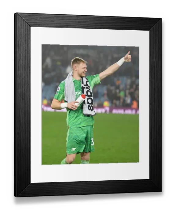 Framed Print : Arsenal's Aaron Ramsdale Thumbs Up to Leeds Fans Amidst Premier League Tension