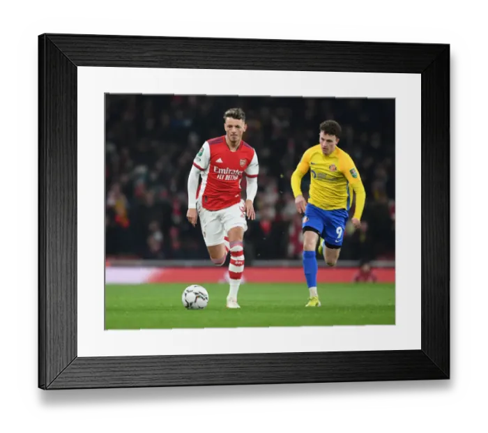 Framed Print : Arsenal's Ben White Overpowers Sunderland's Nathan Broadhead in Carabao Cup Quarterfinal Showdown Framed Print : Arsenal's Ben White Overpowers Sunderland's Nathan Broadhead in Carabao Cup Quarterfinal Showdown
