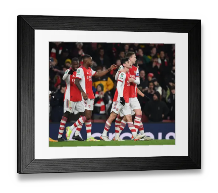 Framed Print : LONDON, ENGLAND - DECEMBER 21: (2ndR) Charlie Patino celebrates scoring the 5th Arsenal goal with (R) Framed Print : LONDON, ENGLAND - DECEMBER 21: (2ndR) Charlie Patino celebrates scoring the 5th Arsenal goal with (R)