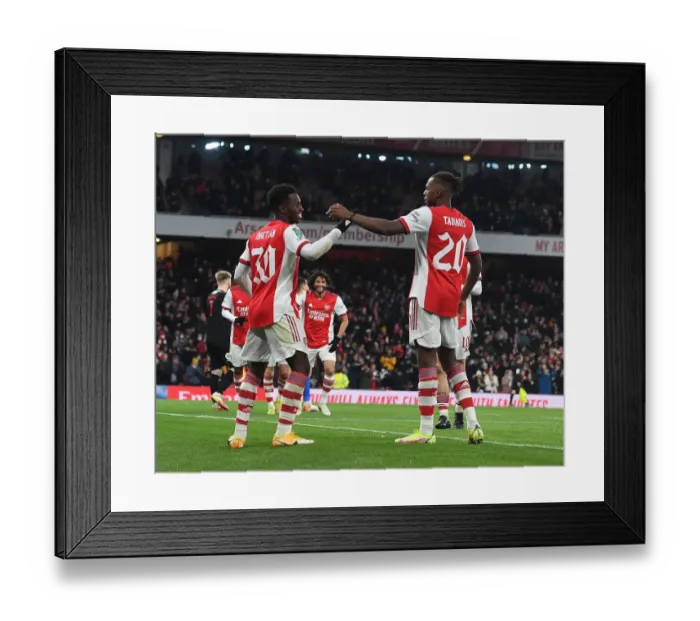 Framed Print : Arsenal's Eddie Nketiah and Nuno Tavares Celebrate Goals in Carabao Cup Quarterfinal Victory over Sunderland