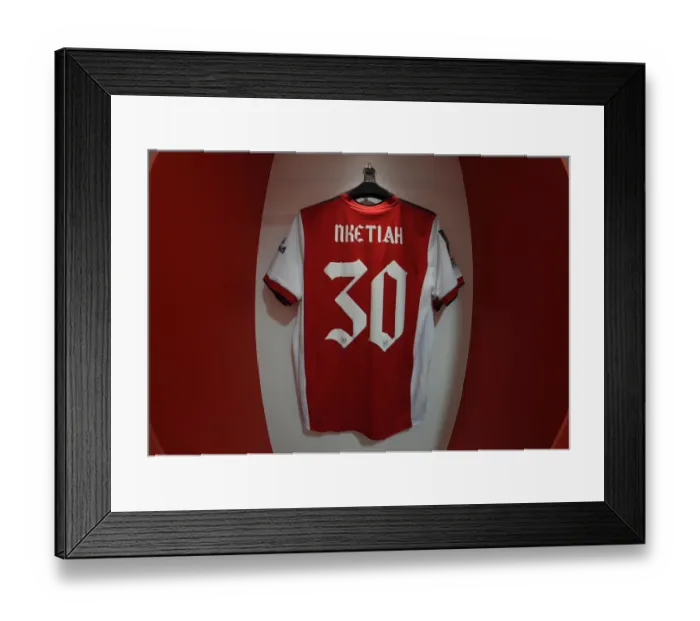 Framed Print : Arsenal's Nketiah Jersey in Emirates Changing Room - Carabao Cup Quarterfinal vs Sunderland Framed Print : Arsenal's Nketiah Jersey in Emirates Changing Room - Carabao Cup Quarterfinal vs Sunderland
