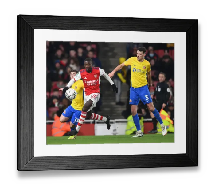 Framed Print : Arsenal's Pepe Clashes with Sunderland Defenders in Carabao Cup Quarterfinal Framed Print : Arsenal's Pepe Clashes with Sunderland Defenders in Carabao Cup Quarterfinal