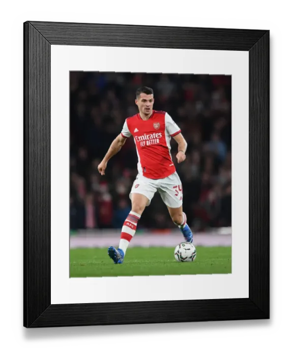 Framed Print : Granit Xhaka's Commanding Display: Arsenal Advance to Carabao Cup Semis Framed Print : Granit Xhaka's Commanding Display: Arsenal Advance to Carabao Cup Semis
