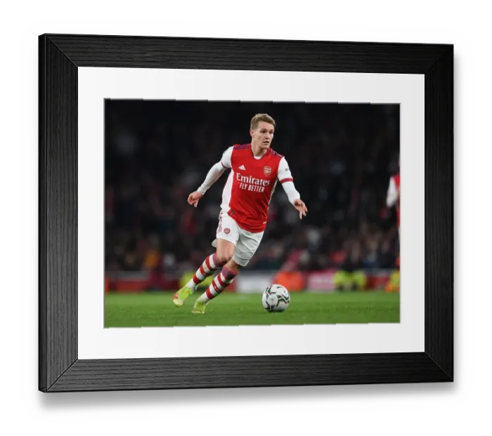 Framed Print : Martin Odegaard in Action: Arsenal's Carabao Cup Battle against Sunderland