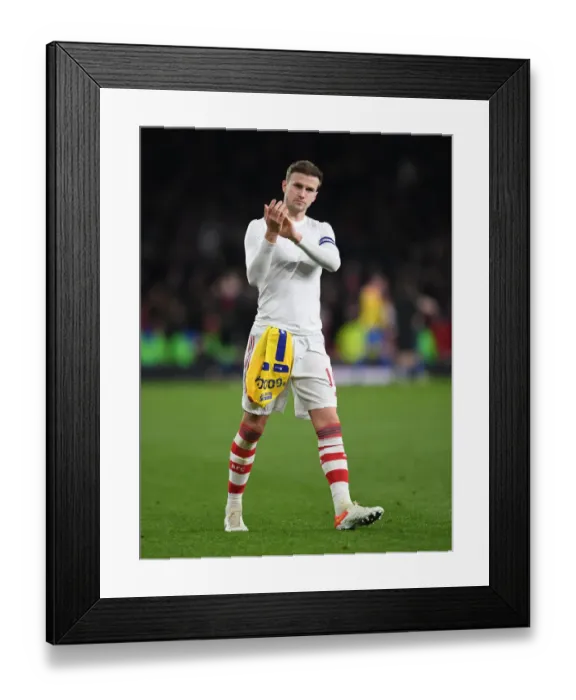 Framed Print : Rob Holding's Triumphant Celebration: Arsenal Reach Carabao Cup Semis