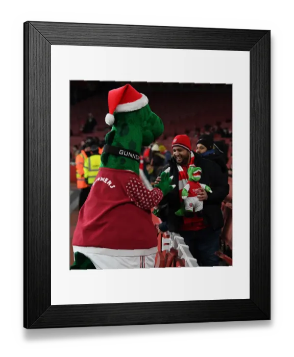 Framed Print : Arsenal FC: Gunnersaurus Statue Amidst Fans Electric Excitement at Carabao Cup Quarterfinal, Emirates Stadium