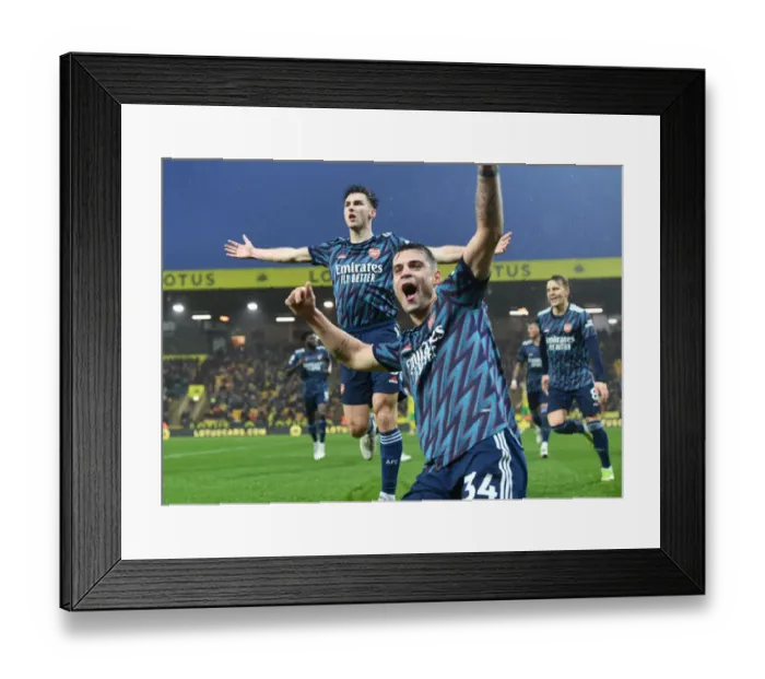Framed Print : Arsenal's Kieran Tierney and Granit Xhaka Celebrate Goals Against Norwich City (December 2021) Framed Print : Arsenal's Kieran Tierney and Granit Xhaka Celebrate Goals Against Norwich City (December 2021)