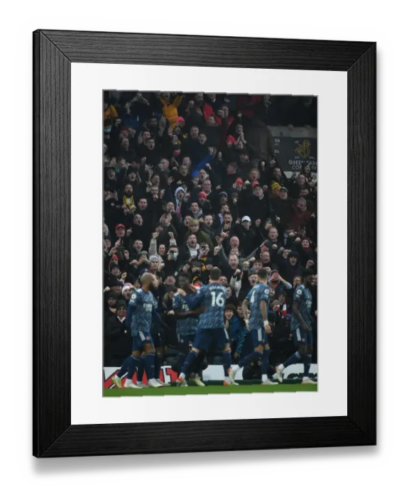Framed Print : Arsenal Fans Euphoria: First Goal vs. Norwich City in Premier League