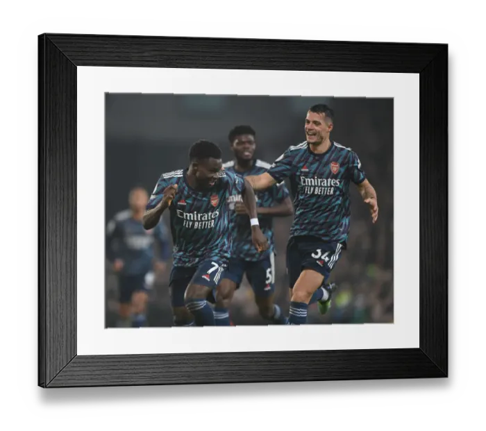 Framed Print : Arsenal's Unstoppable Duo: Saka and Xhaka's Thrilling Goal Celebration vs Norwich City