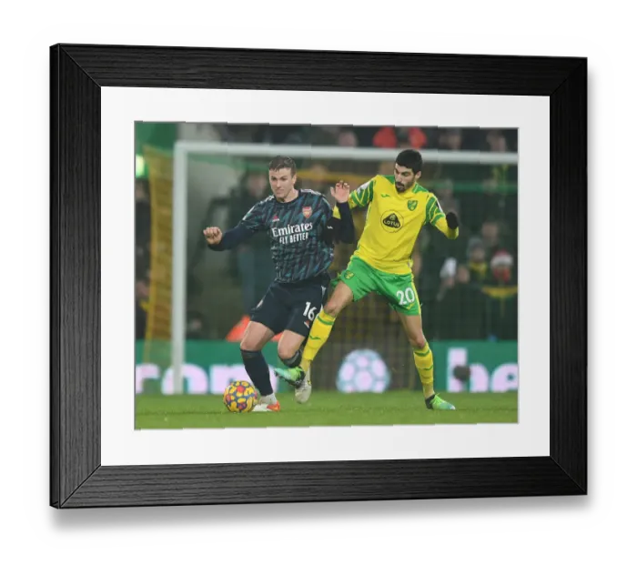 Framed Print : Holding vs. Lees-Melou: A Premier League Clash at Carrow Road
