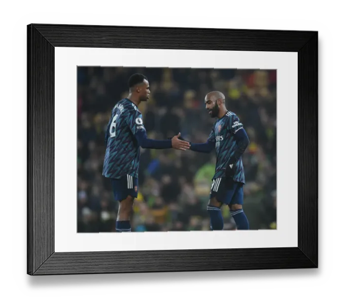 Framed Print : Alexandre Lacazette's Brace: Arsenal's 4-0 Thrashing of Norwich City in Premier League
