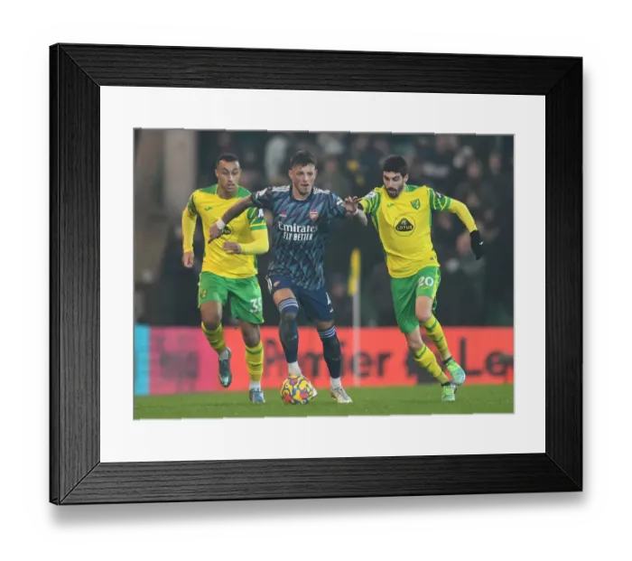 Framed Print : Arsenal's Ben White vs. Norwich's Pierre-Lees Melou: A Premier League Battle