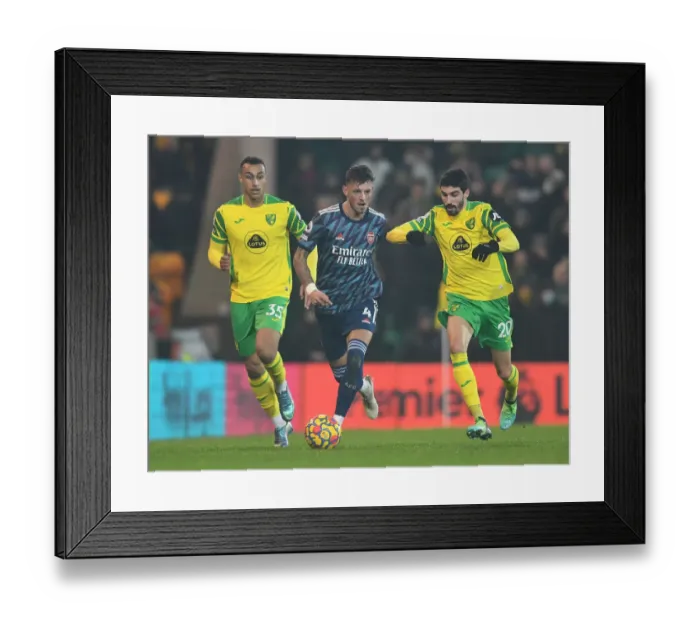 Framed Print : Arsenal's Ben White Goes Head-to-Head with Norwich's Pierre-Lees Melou: A Premier League Showdown Framed Print : Arsenal's Ben White Goes Head-to-Head with Norwich's Pierre-Lees Melou: A Premier League Showdown