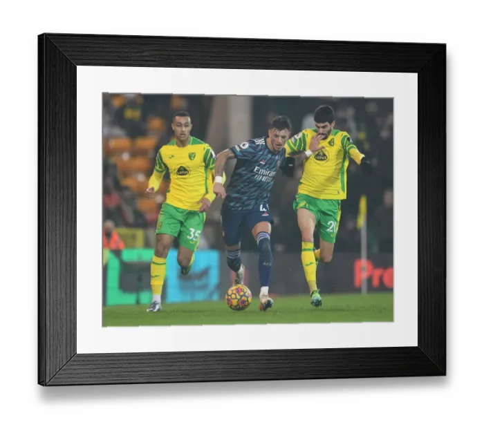 Framed Print : Arsenal's Ben White Clashes with Norwich's Pierre-Lees Melou: A Premier League Showdown